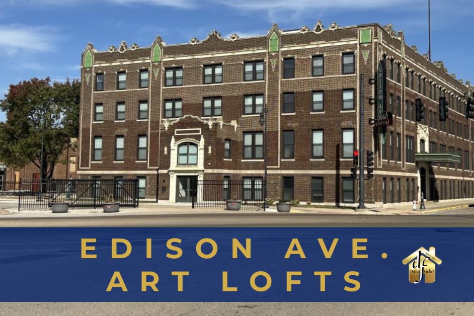 Exterior photo of 4 story historic brick building with words Edison Ave Art lofts