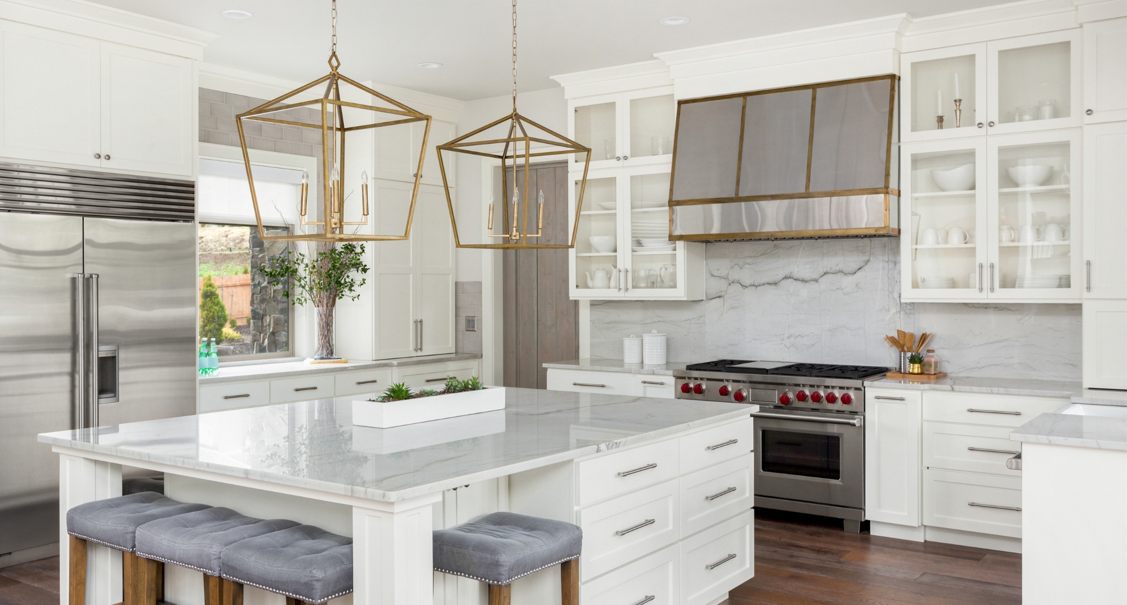 Kitchen Island Blue Stools Gold fixtures White Cabinets