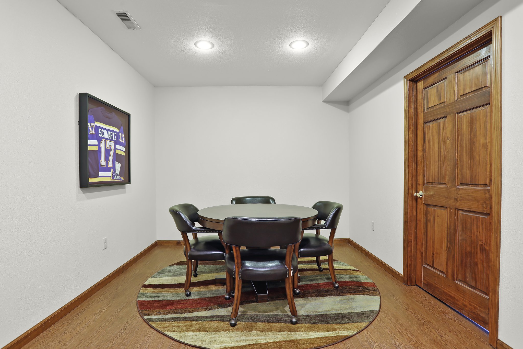 Home features a Lower Level Game Room/Bonus Room, Vinyl Plank Wood-Like Tile Flooring and Recessed Lighting