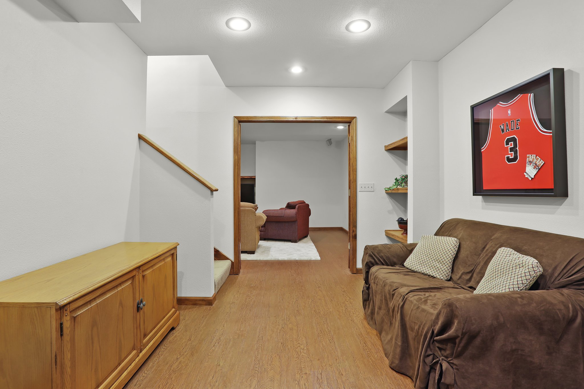 Home features a lower Level, Game Room/Bonus Room, Vinyl Plank Wood-Like Tile Flooring and Recessed Lighting