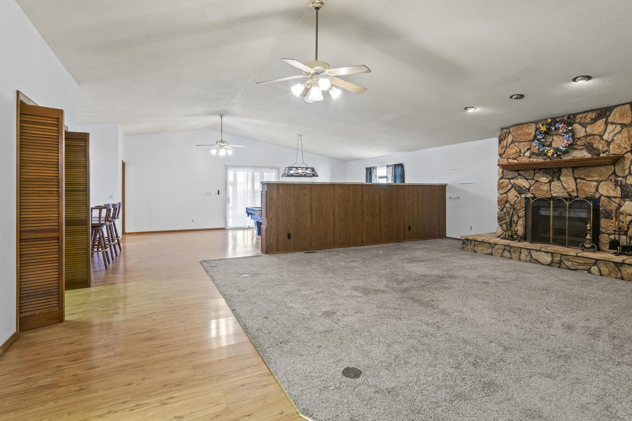 Great Room, Vaulted Ceilings, Laminate wood-style floor,