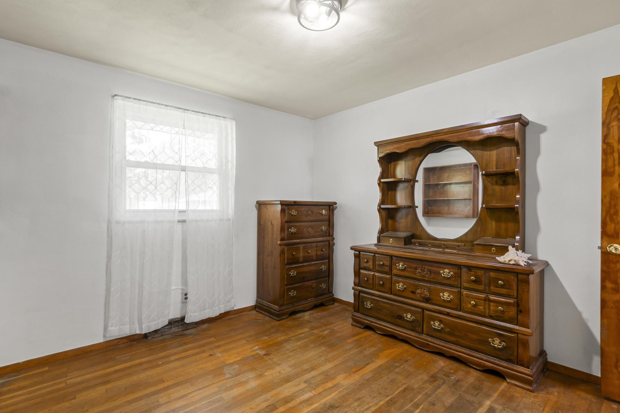 Bedroom 1, wood floors