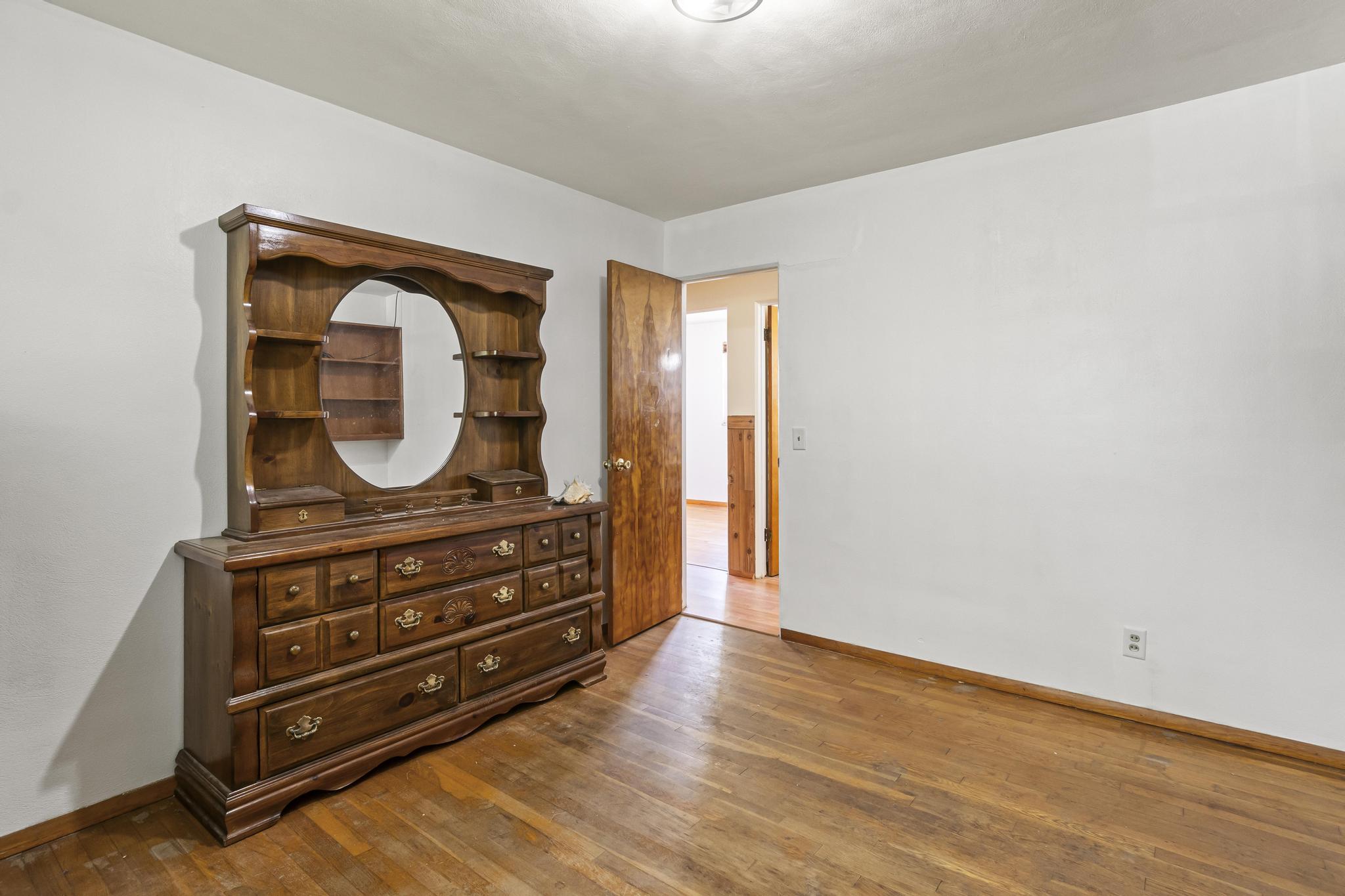 Bedroom 1, wood floors
