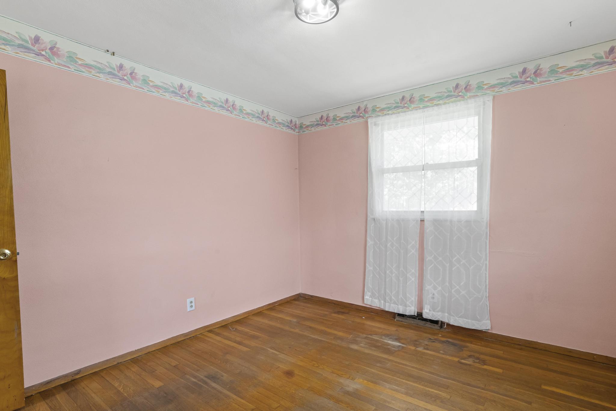 Bedroom 2, wood floors