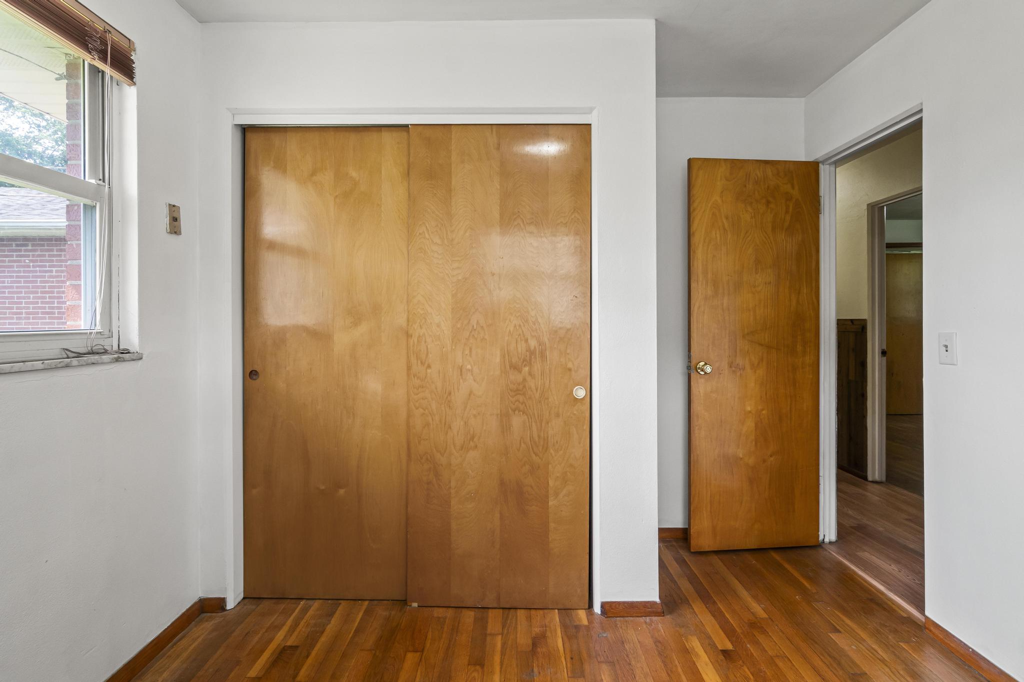 Bedroom 3, wood floors and double closet