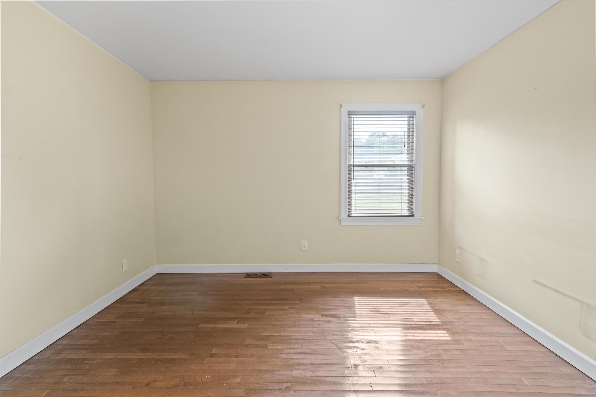Master with wood flooring