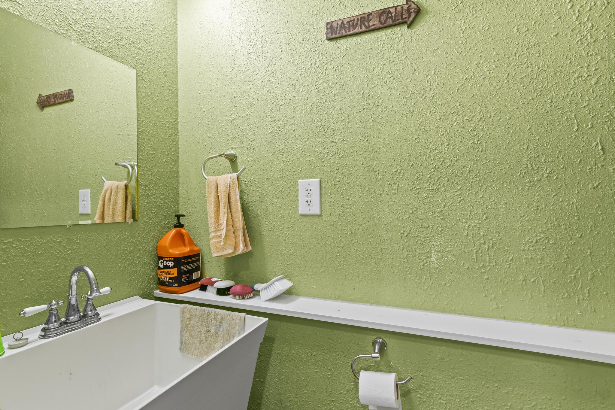 Garage office bathroom with sink