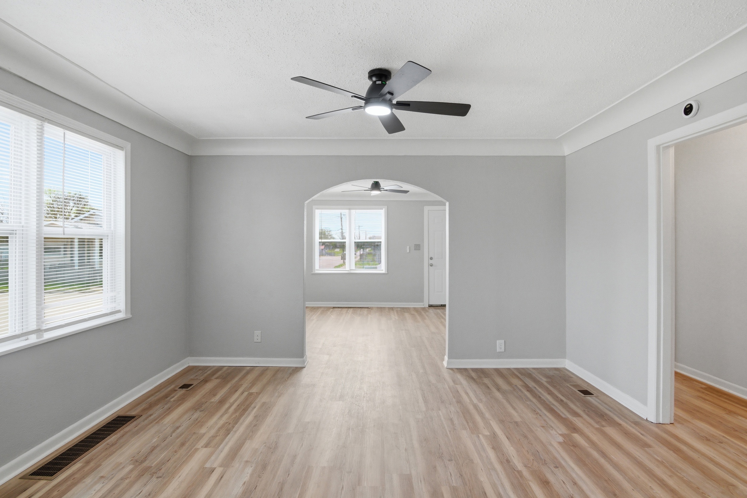 Wide angel of dining area view to Living & Common Hallway at 1929 Beckwith St. Madison.